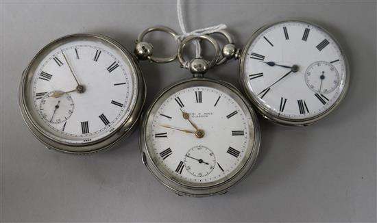 Three assorted silver pocket watches including one retailed by Muir & Sons, Glasgow.